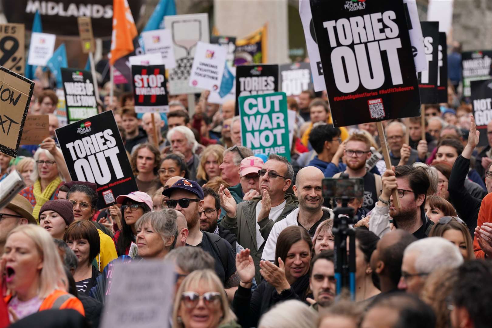 Protesters outside the Conservative Party conference (Jacob King/PA)