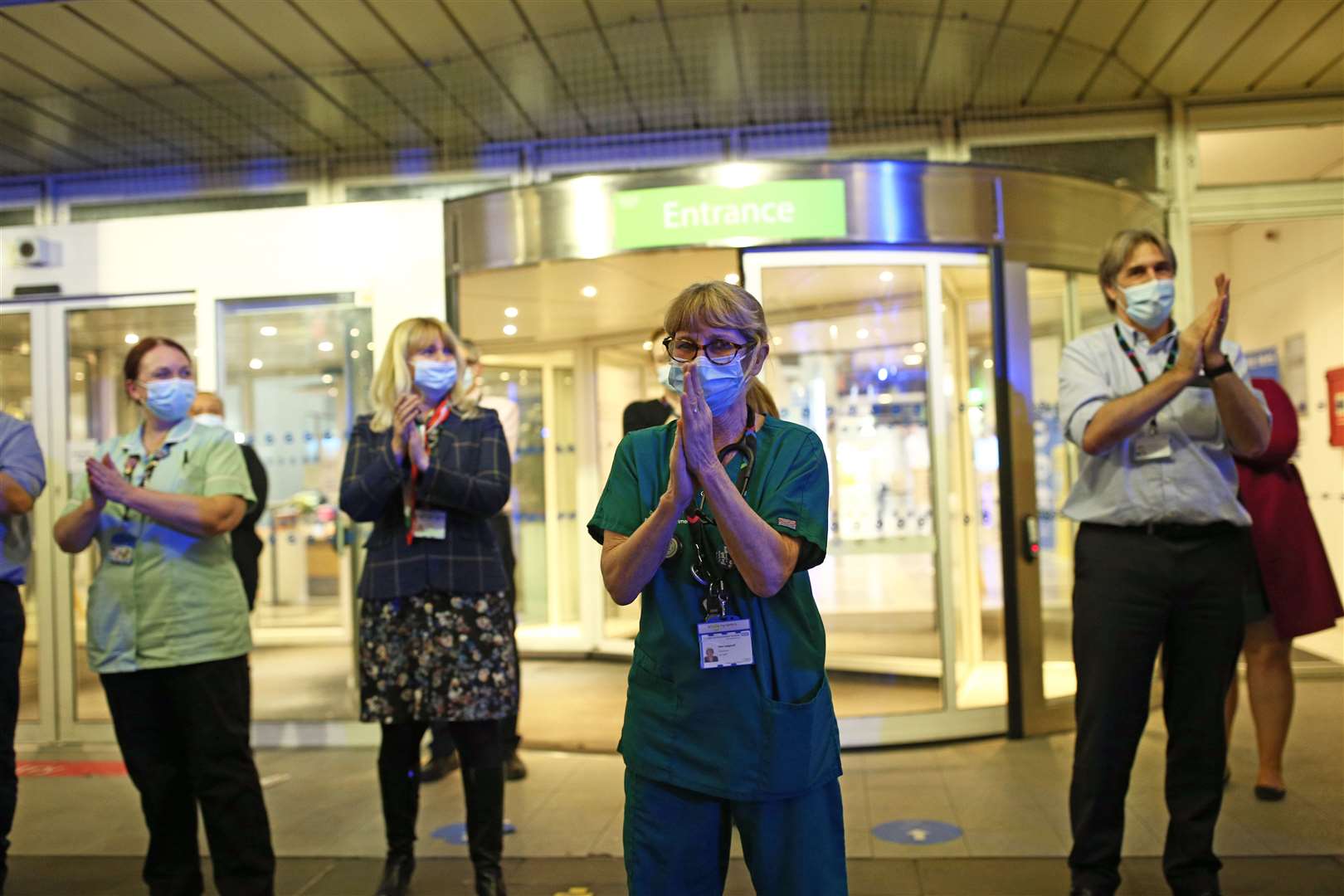 Doctors, nurses and NHS staff pay tribute outside the Chelsea and Westminster Hospital in London (Yui Mok/PA)