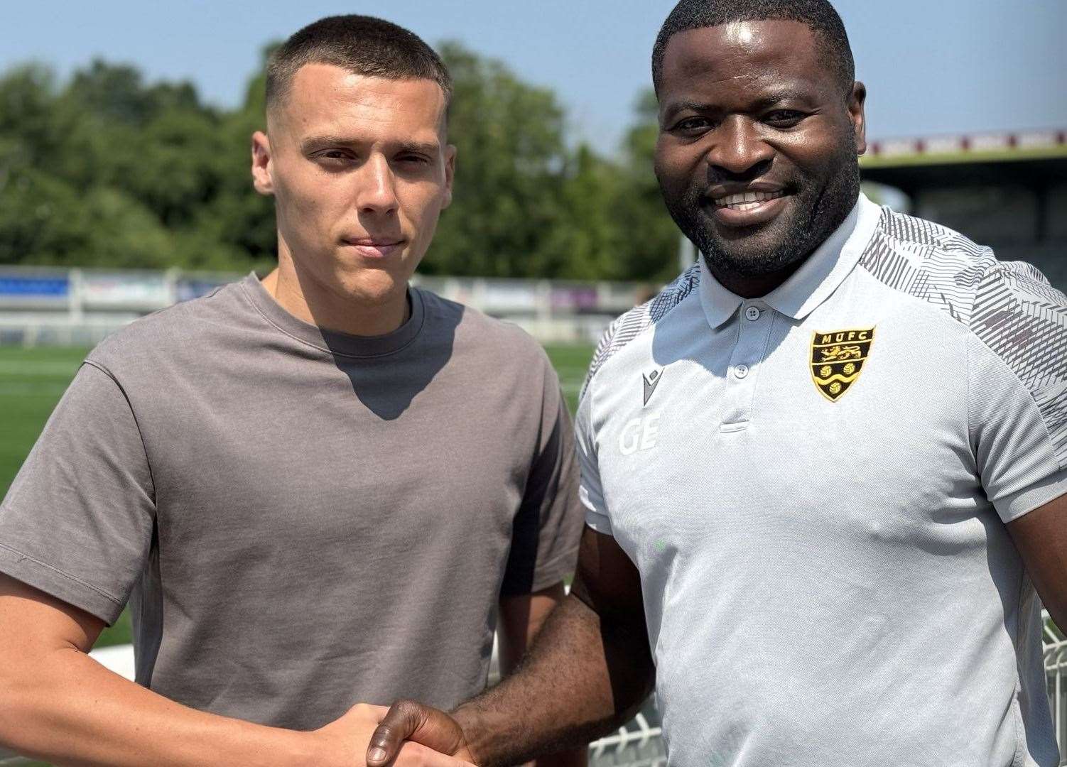 New signing Arjanit Krasniqi with Maidstone manager George Elokobi. Picture: MUFC