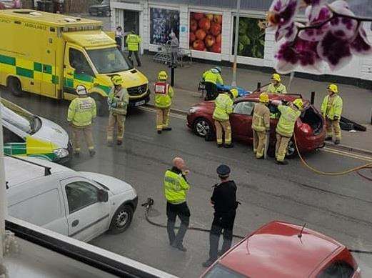 A person was cut free from their car. Credit: Loulou Miller (2614423)