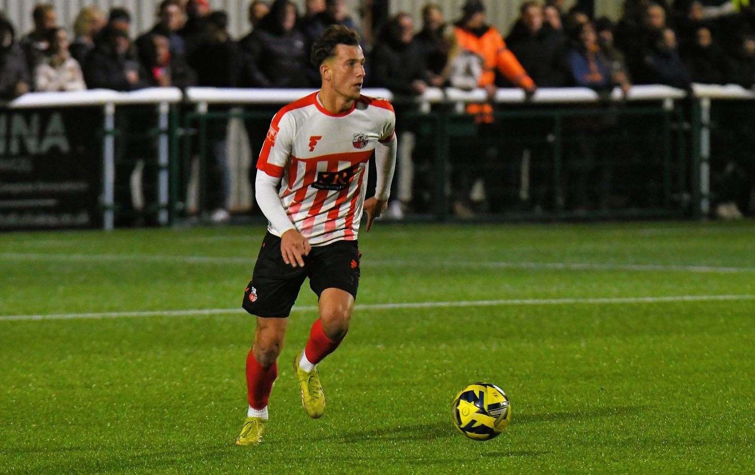 Makeshift Sheppey centre-back Connor Wilkins on the ball. Picture: Marc Richards