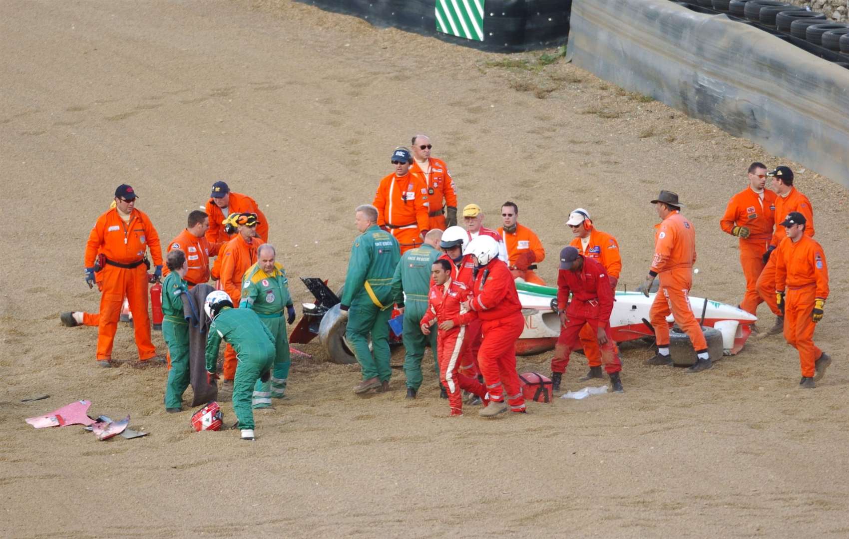 Beschir is helped away from the wreckage. Picture: Barry Goodwin