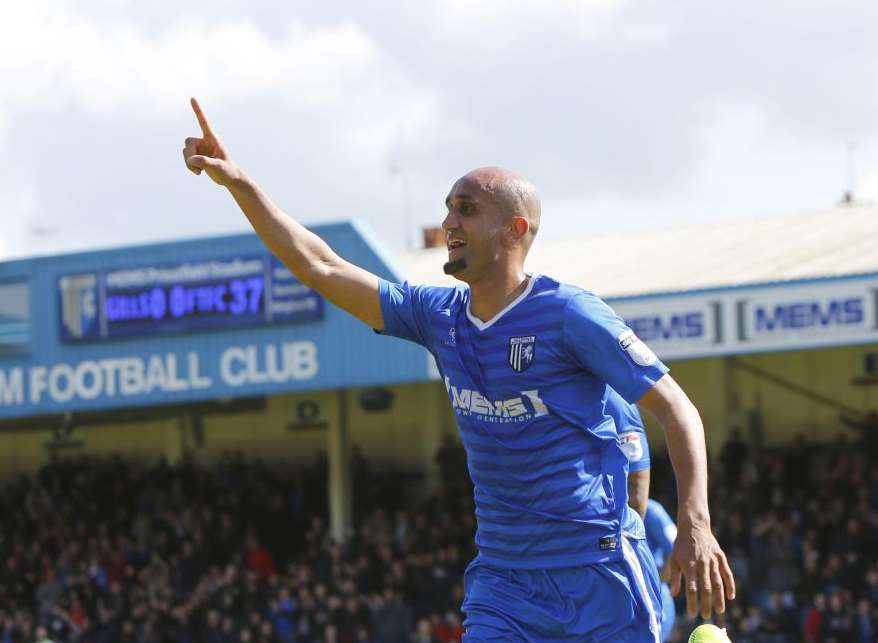 Zesh Rehman celebrates a goal for Gillingham Picture: Andy Jones