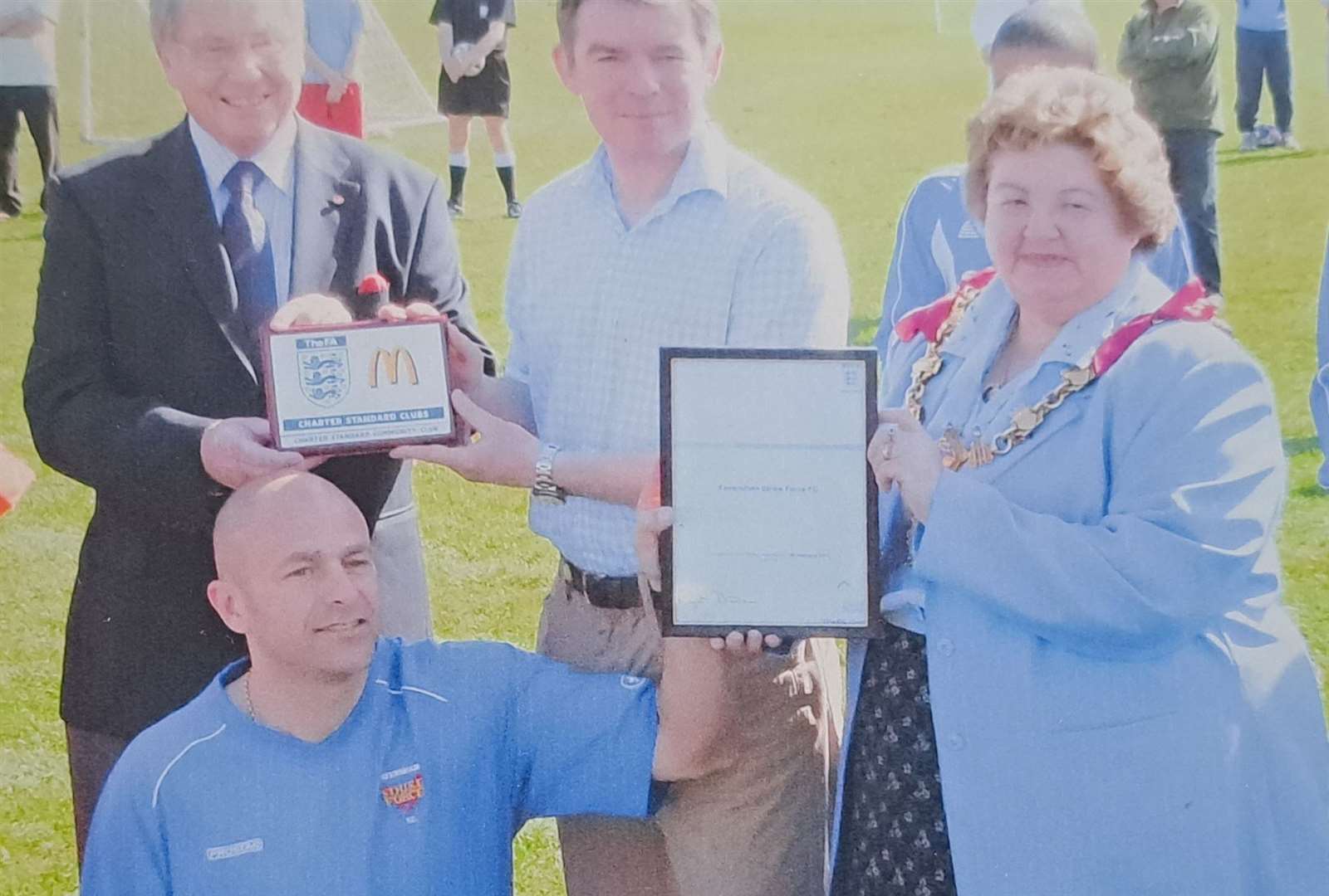 Hugh Robertson, then-sports minister, is on hand as Faversham Strike Force gain their Charter Standard in April 2011