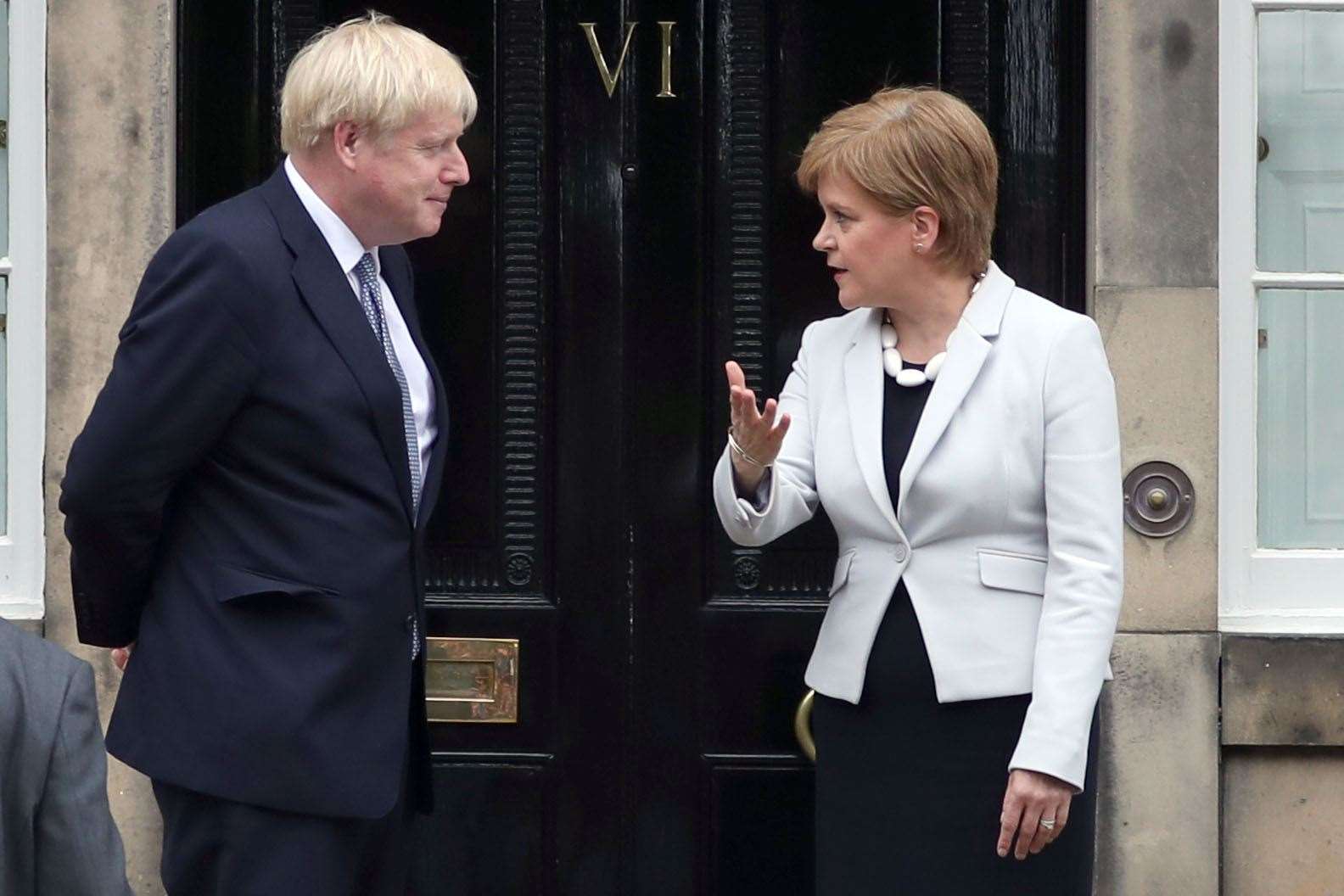 Scotland’s First Minister Nicola Sturgeon and Prime Minister Boris Johnson outside Bute House in Edinburgh (Jane Barlow/PA)