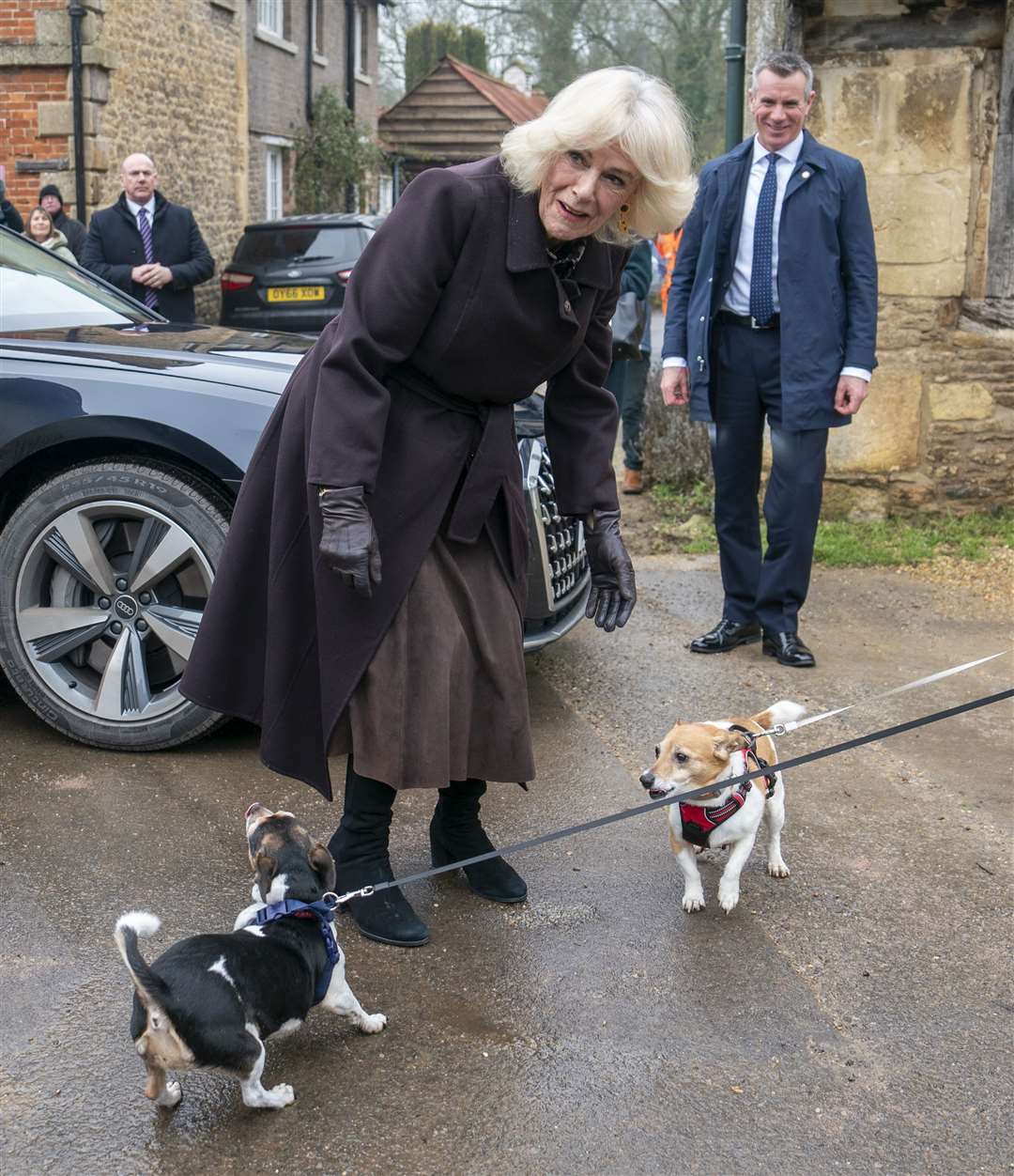 The Queen greeting Beth and Bluebell, who she adopted from Battersea Dogs and Cats Home (Arthur Edwards/The Sun/PA)