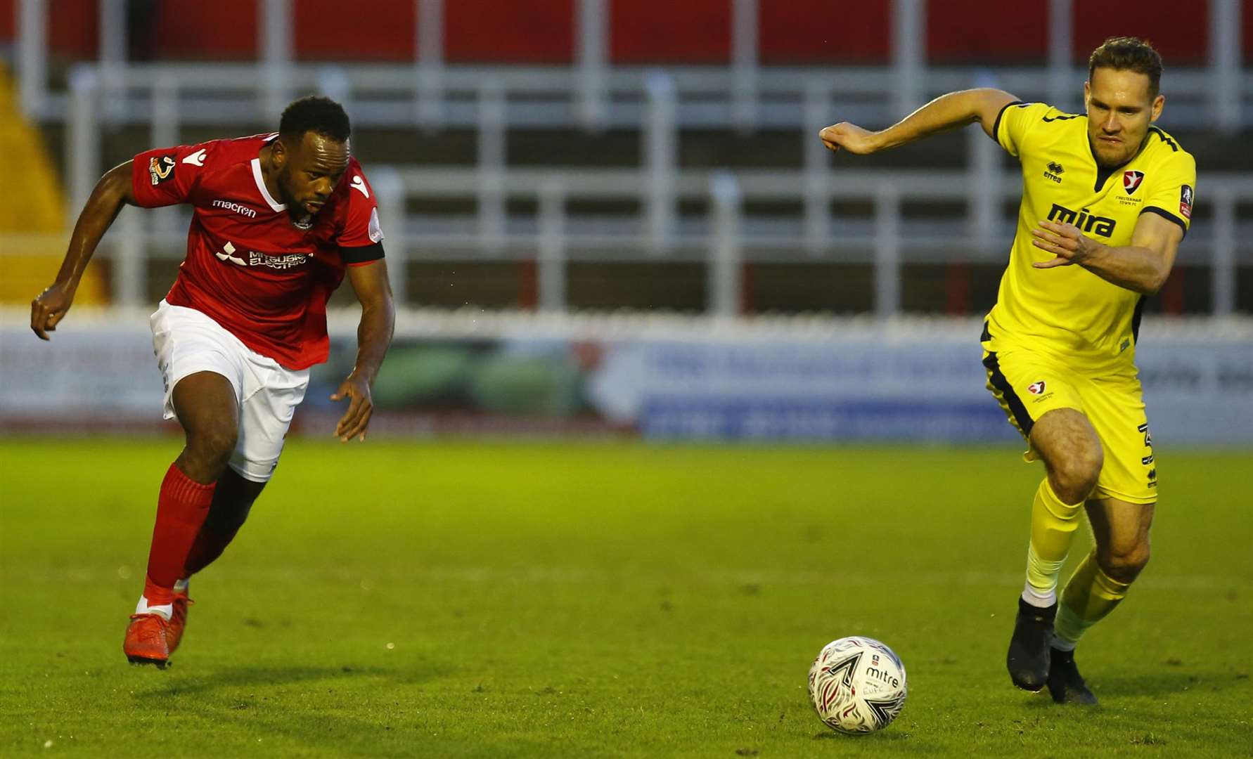 Midfielder Myles Weston in a race for the ball Picture: Andy Jones