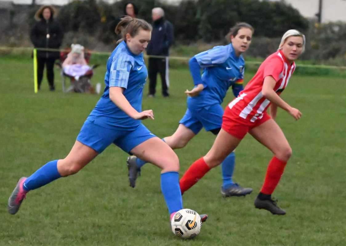 Emily Brown drives forward for Faversham Strike Force’s women in a win against Betteshanger last season