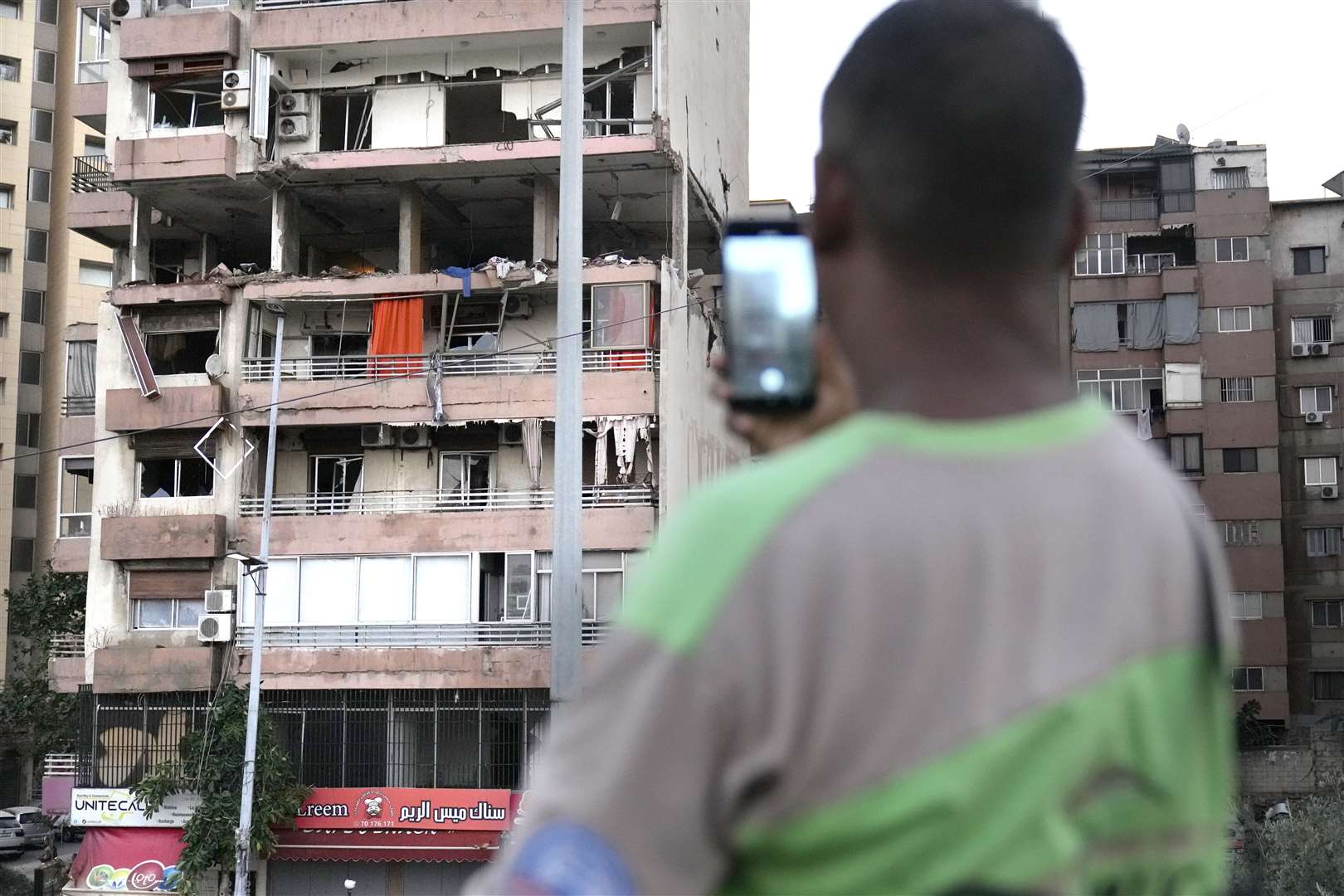 An apartment block damaged by an Israeli strike in Lebanon (Hussein Malla/AP)