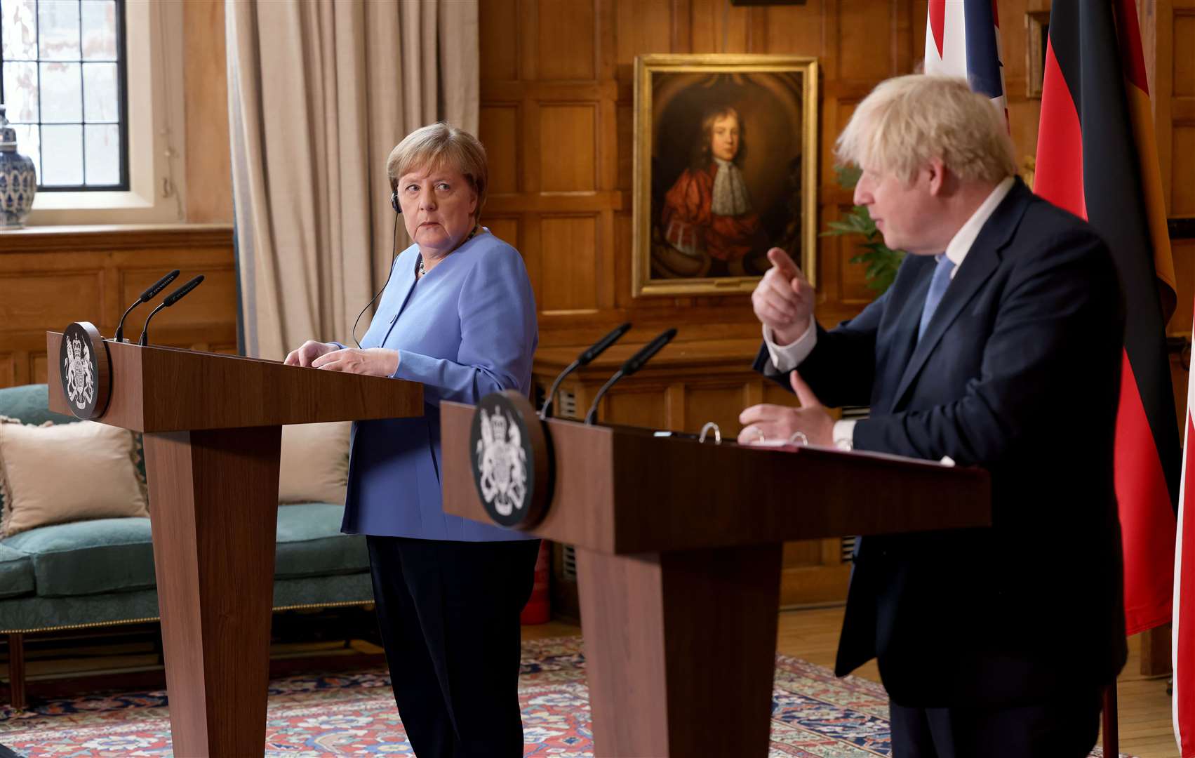 Prime Minister Boris Johnson and the Chancellor of Germany, Angela Merkel, during a press conference after their meeting at Chequers (Jonathan Buckmaster/PA)