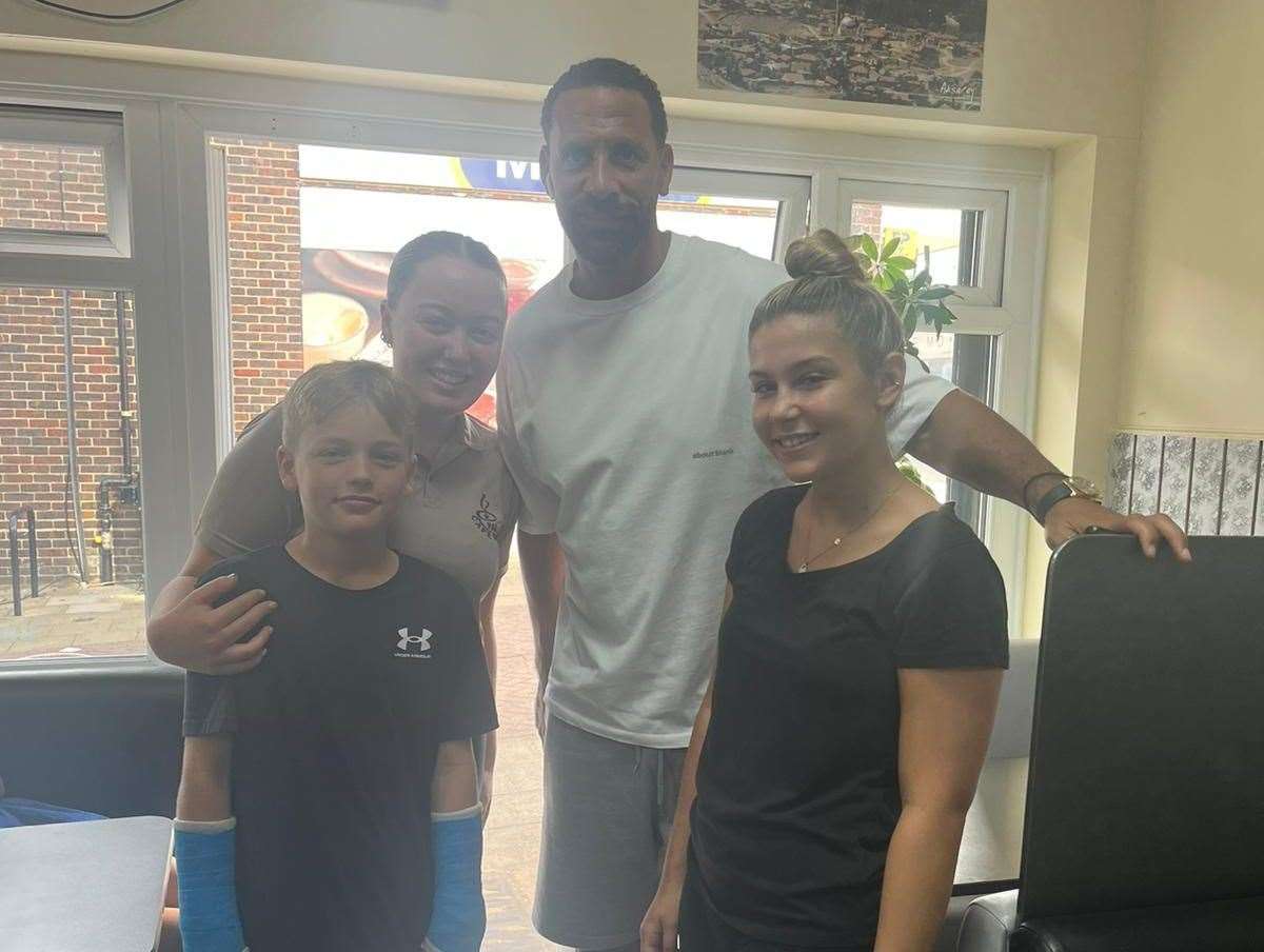 Rio Ferdinand with the staff at Parkwood Cafe in Rainham. Picture: Parkwood Cafe