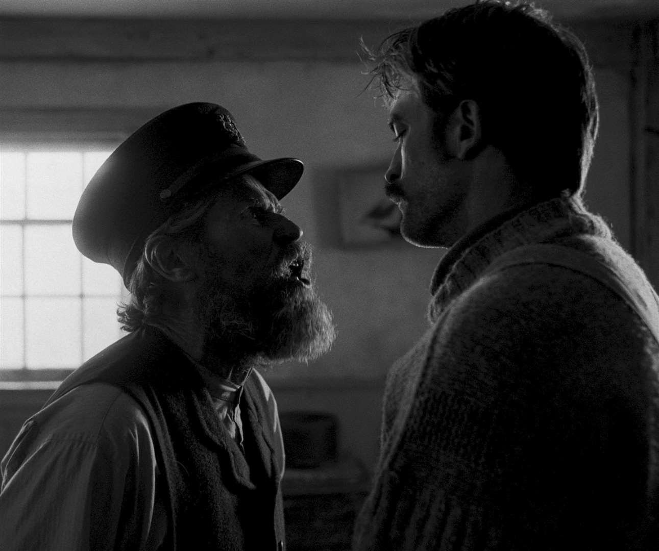 The Lighthouse. Pictured: Willem Dafoe as Thomas Wake and Robert Pattinson as Ephraim Winslow Picture: PA Photo/Universal Pictures International/A24 Films