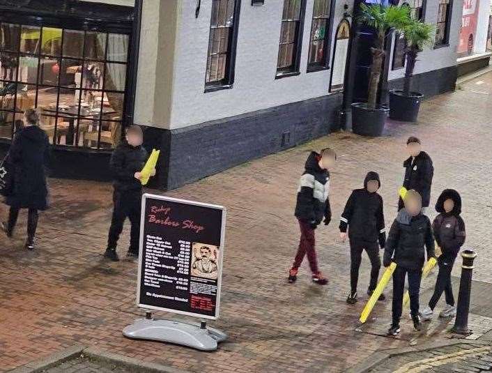 A group of youths in Sittingbourne High Street were seen pulling the protection foam from scaffolding and trying to hit people with it. Picture: Matilda Johnson