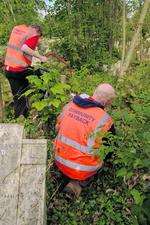 Offenders on Community Payback help to improve the graveyard at St Peter's Church