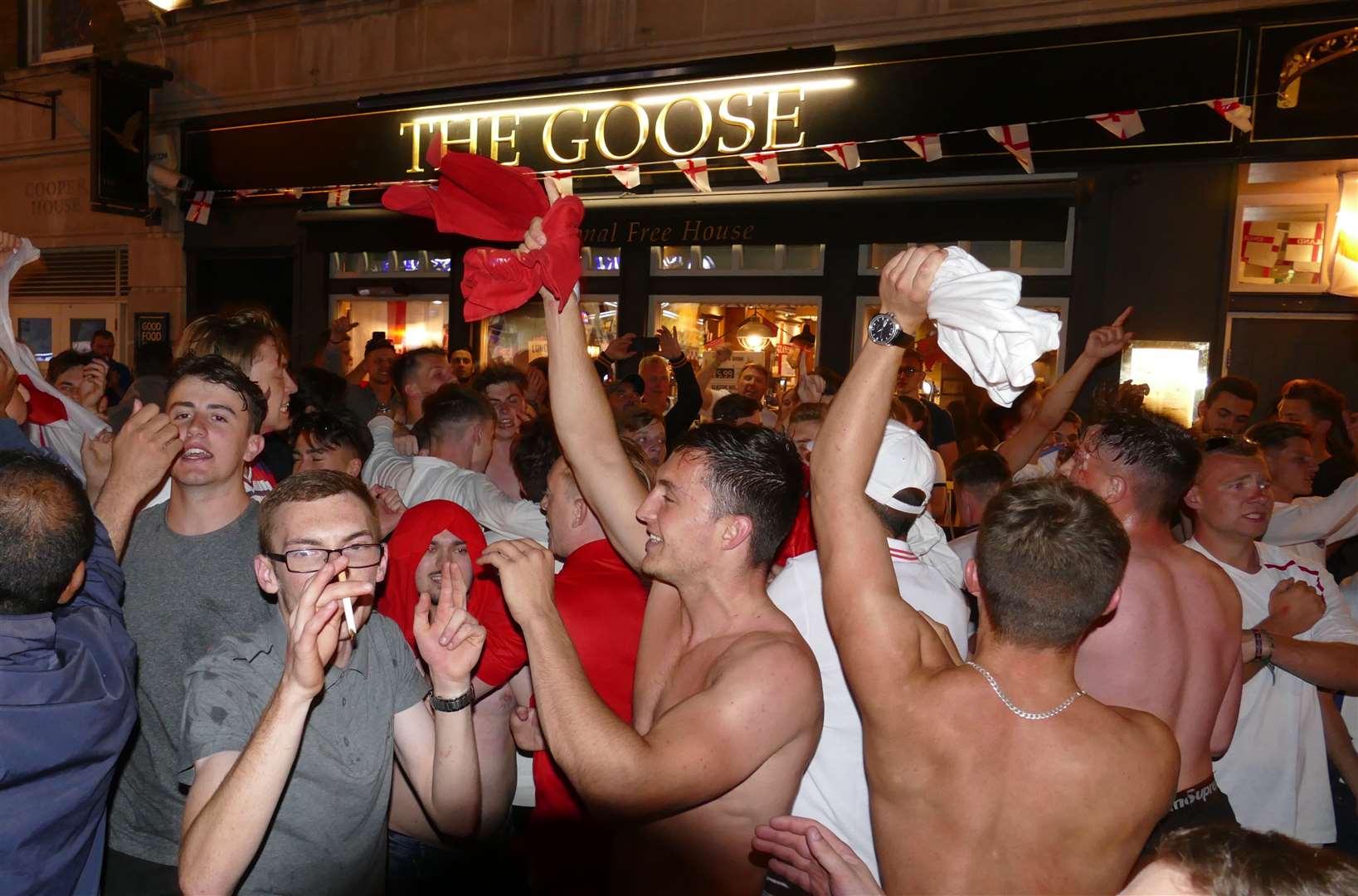 England fans celebrating outside The Goose in Gravesend. Picture: Fraser Gray