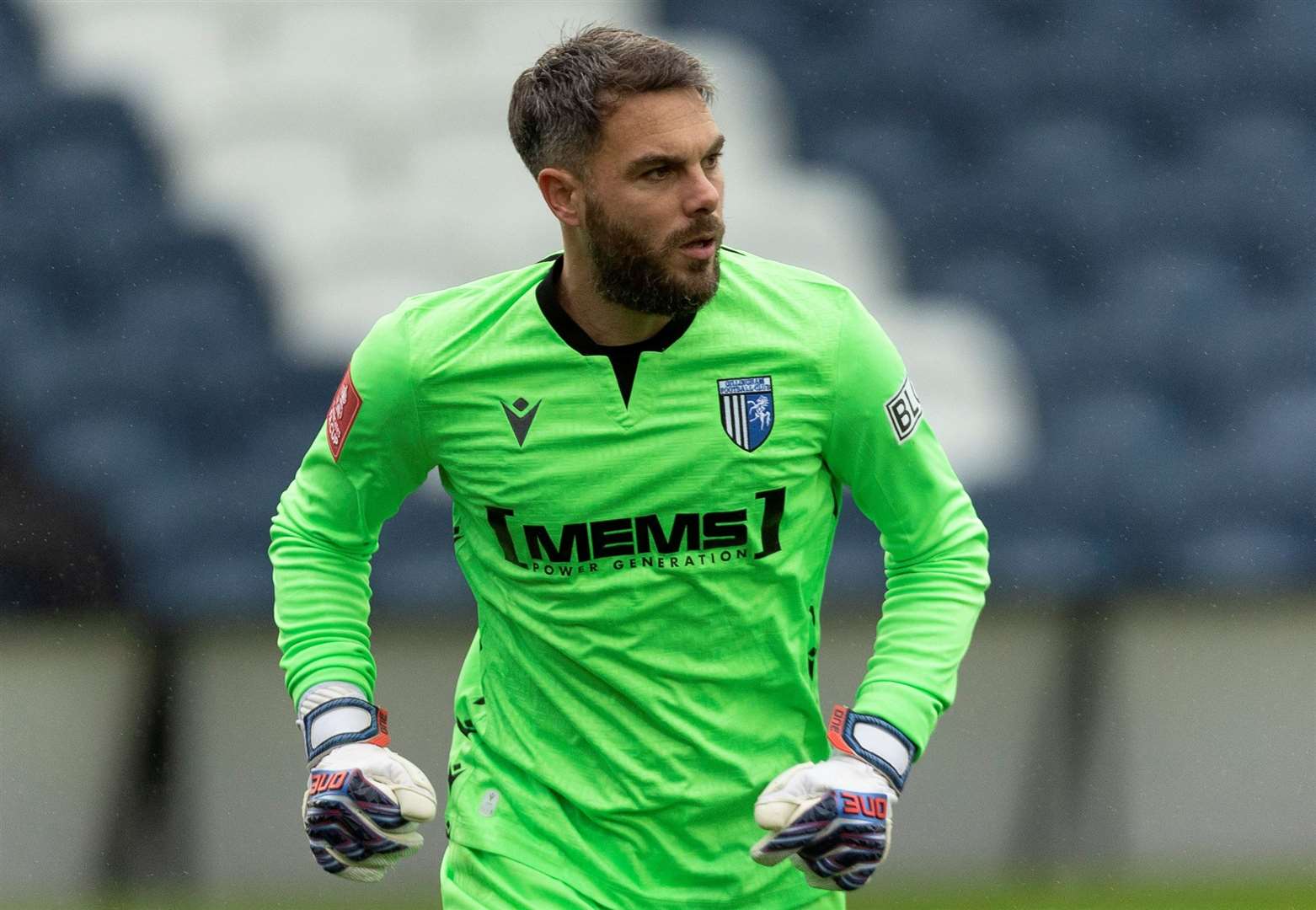 Gillingham keeper Glenn Morris has extended his stay at the club.