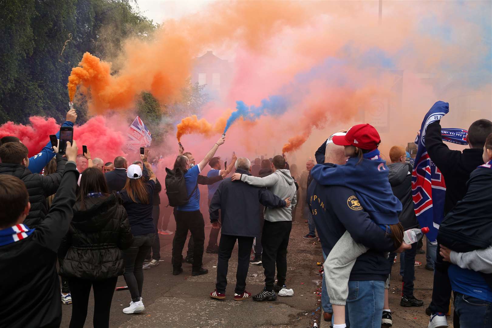 The fans gathered despite being advised not to do so (Robert Perry/PA)