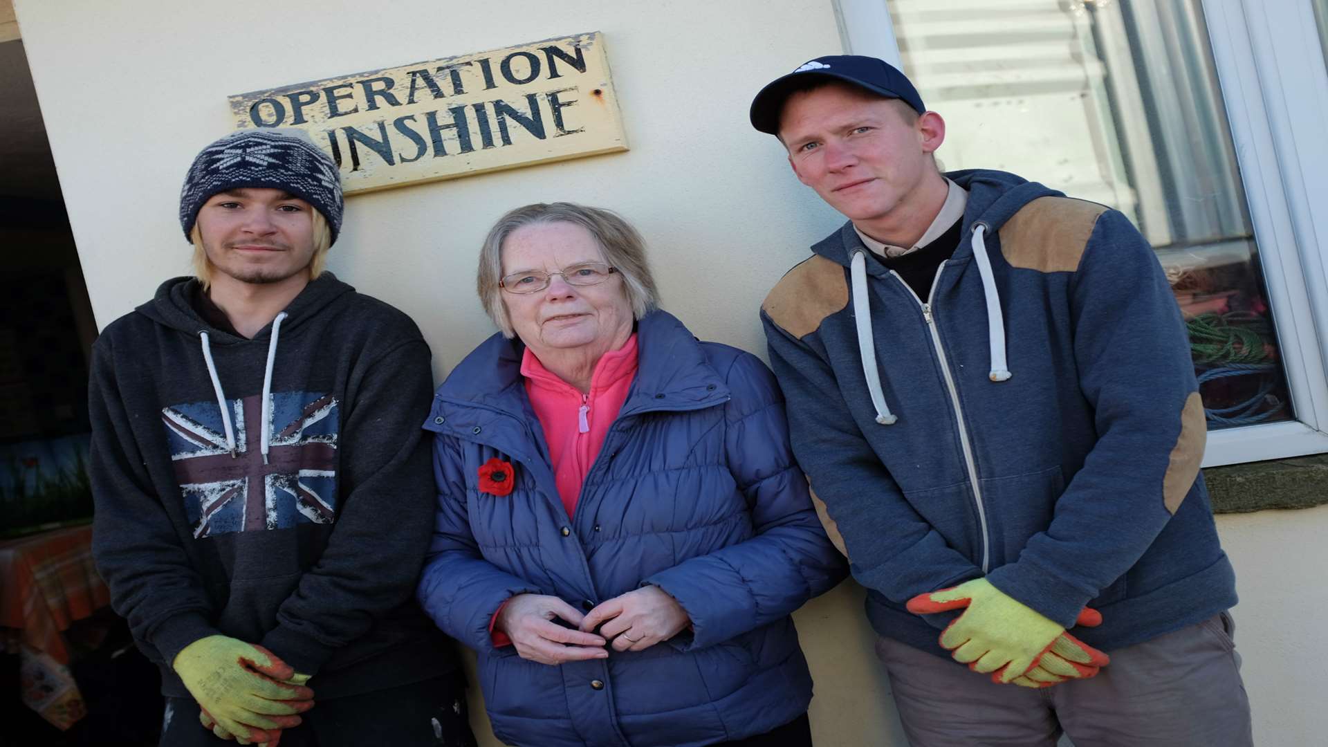 Michael Walters, Lyn Callander and Elliot Bannister load aid for Africa