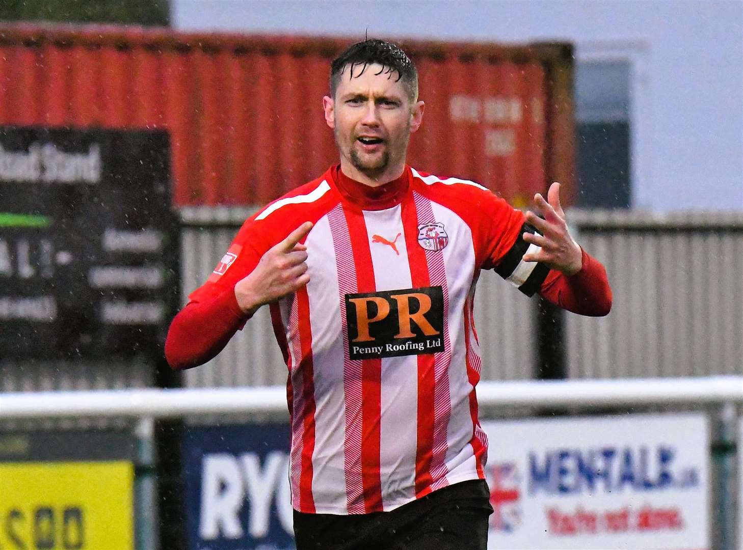 Sheppey striker Dan Bradshaw celebrates after scoring his 150th goal for Sheppey against Hythe on New Year’s Day Picture: Marc Richards