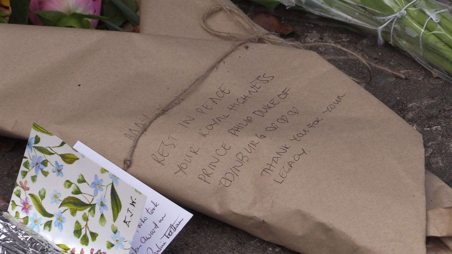 Flowers have been left outside the gates of Balmoral Castle (Douglas Barrie/PA)