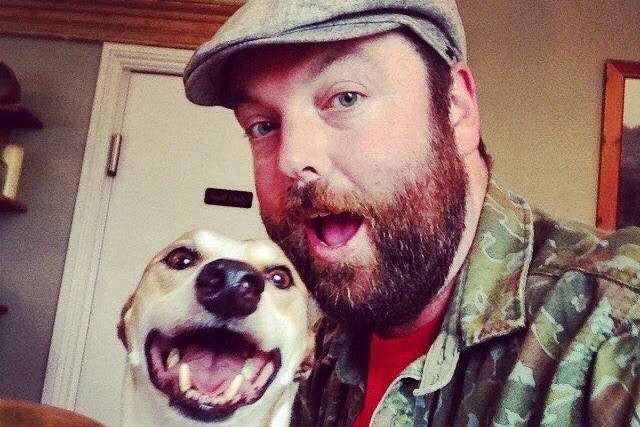 Matthew Field, pictured with greyhound Dave, found the spider