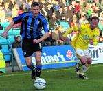 Mark Bentley takes on the Torquay defence