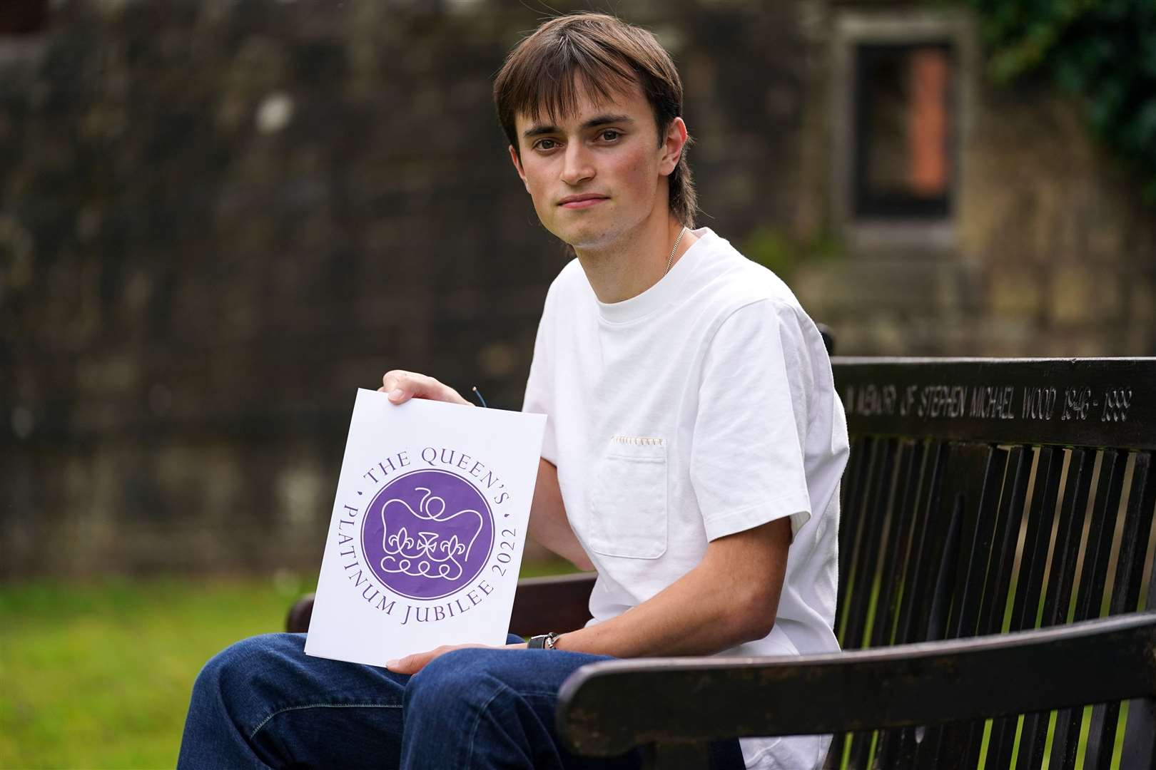 Edward Roberts with his winning design (Jacob King/PA)