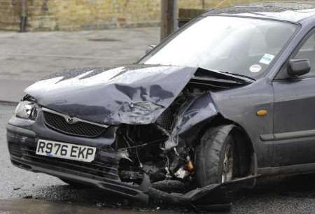 The collision wrecked the front of the Mazda