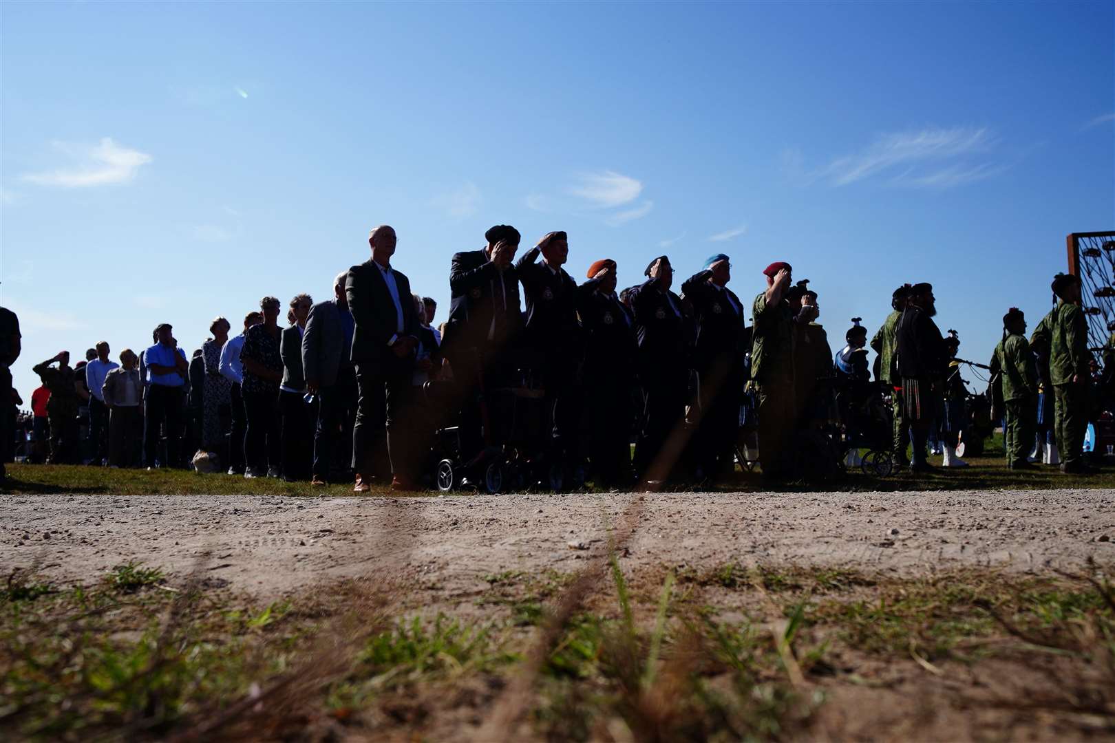 Veterans salute (front row,left) (Ben Birchall/PA)