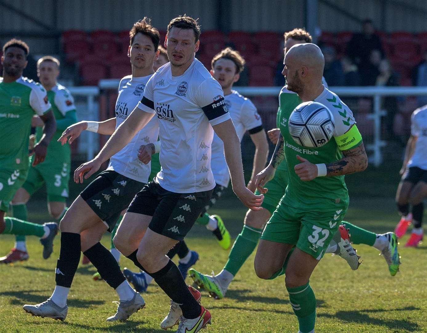 Dover captain Jake Goodman tries to beat Yeovil counterpart Josh Staunton to a loose ball. Picture: Stuart Brock