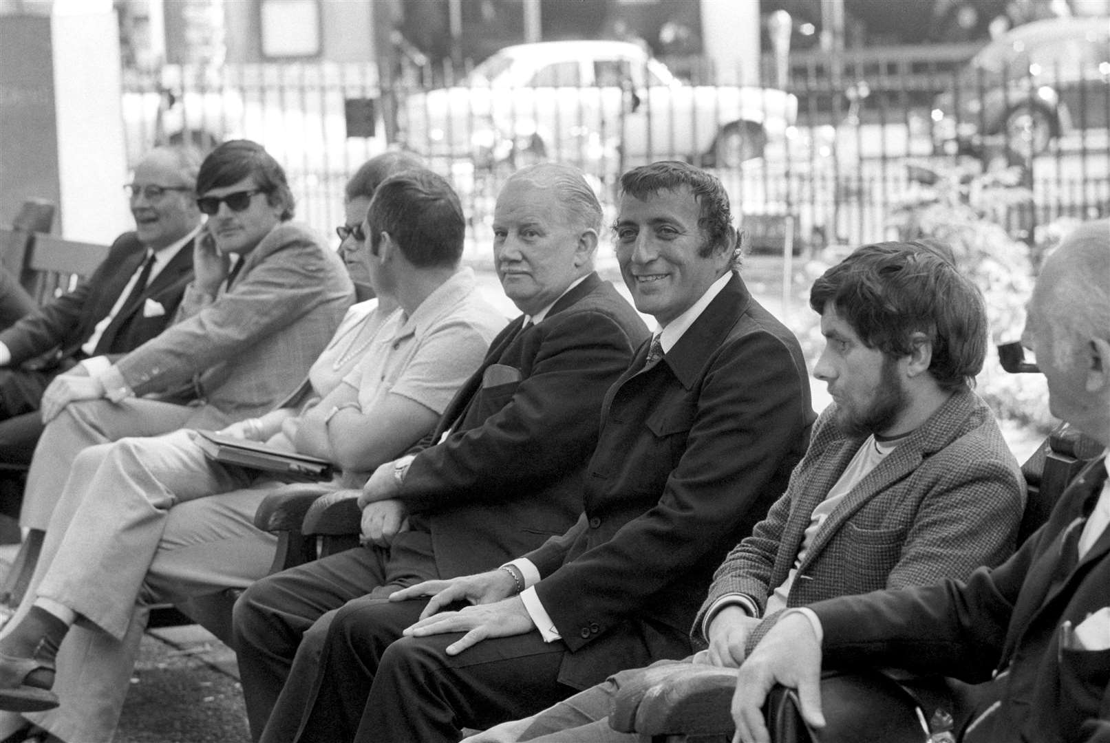 American singer Tony Bennett joins locals on a park bench in London (Archive/PA)