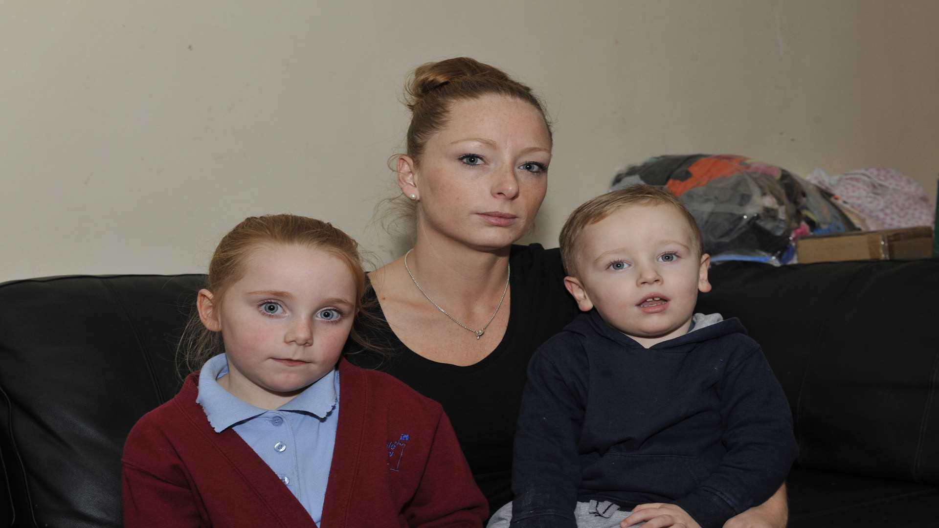 Emily Shephard with her two children before they were evicted and forced to seek accommodation in a hotel