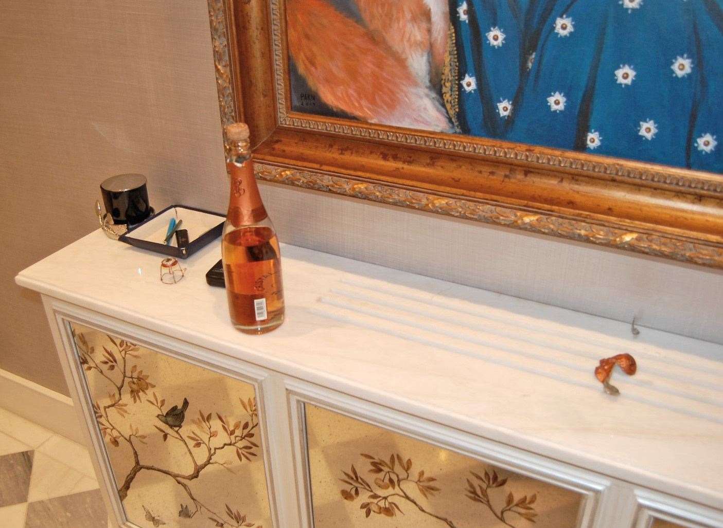 An opened £500 bottle of champagne left by burglars at the home of the late Leicester City FC chairman Vichai Srivaddhanaprabha (Metropolitan Police/PA)