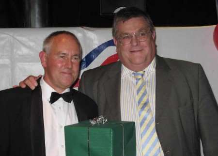 David Sear, left, outgoing Kent cricket development manager, at the Kent girls' cricket end-of-year gala on board SeaFrance ferry Rodin, with Bill Laidlaw, SeaFrance commercial director