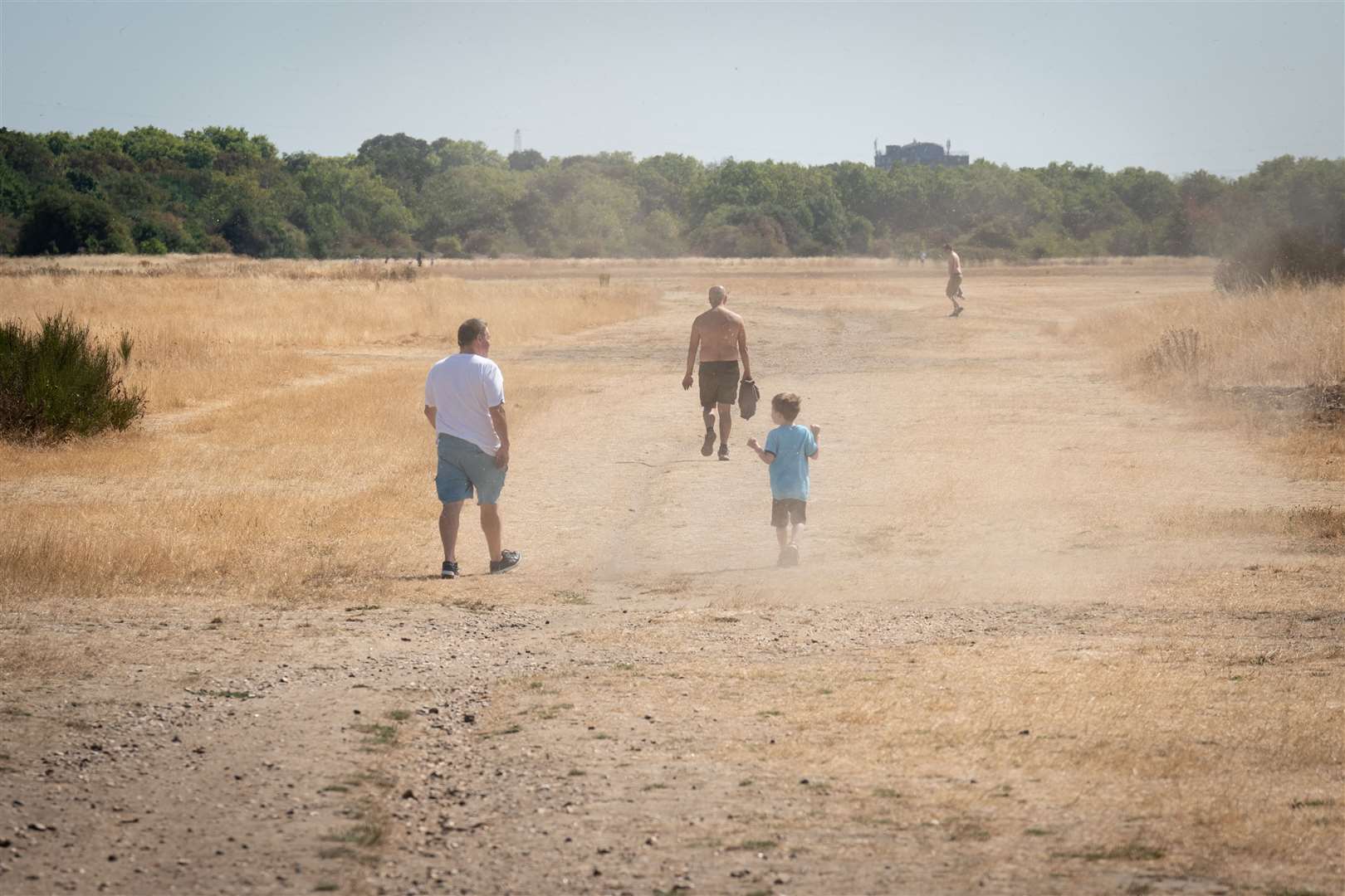 Visitors to Wanstead Flats in north-east London enjoy the hot weather (Stefan Rousseau/PA)