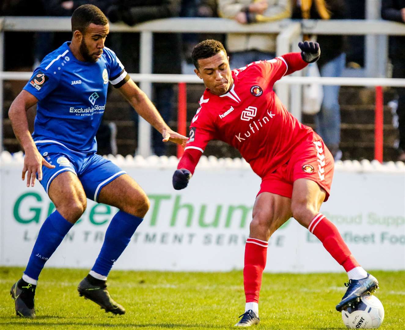 Ebbsfleet's Alex Reid is tracked by Dover skipper Kevin Lokko. Picture: Matthew Walker. FM25358514