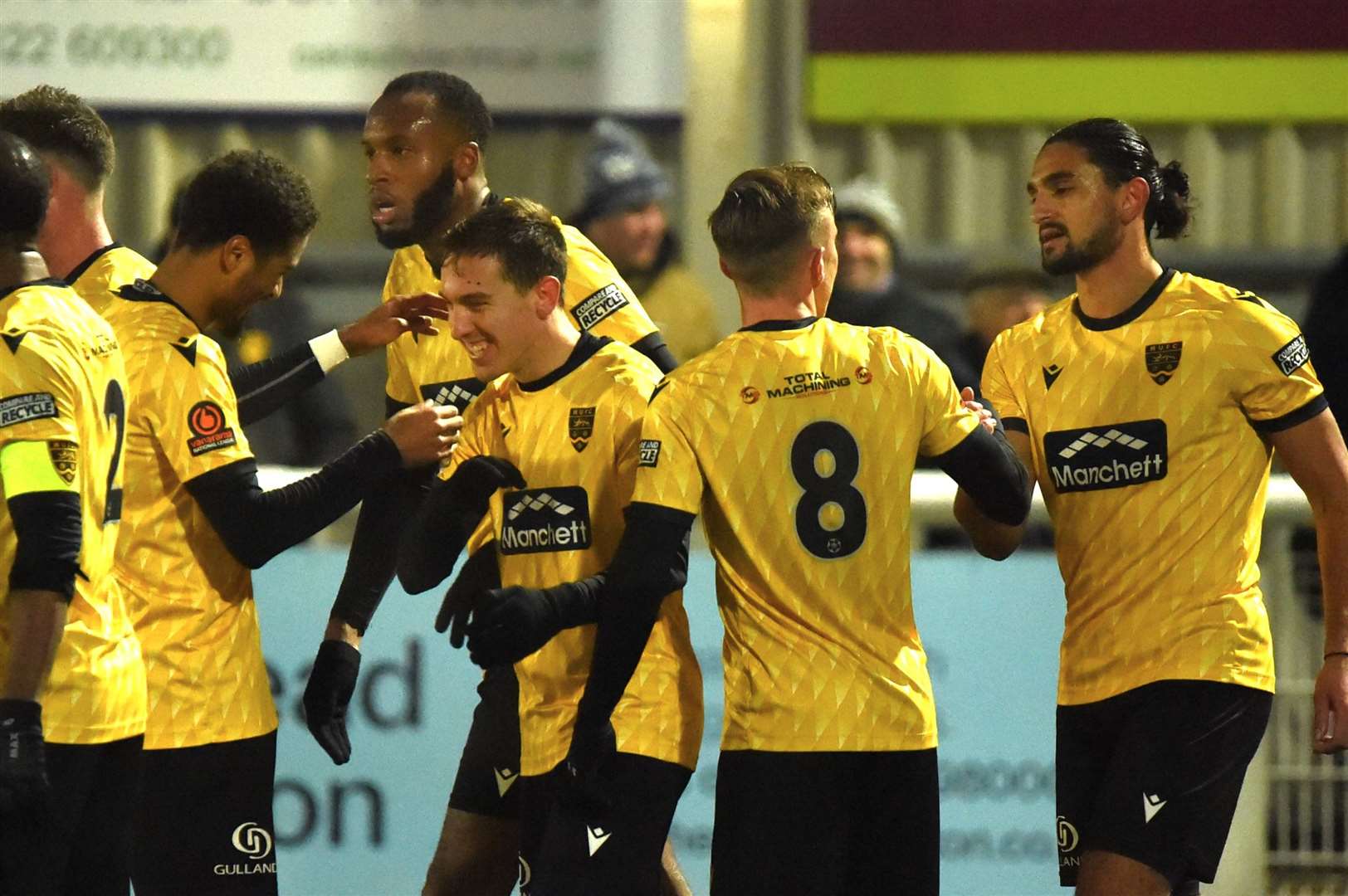 Matt Rush, centre, celebrates a goal. Picture: Steve Terrell