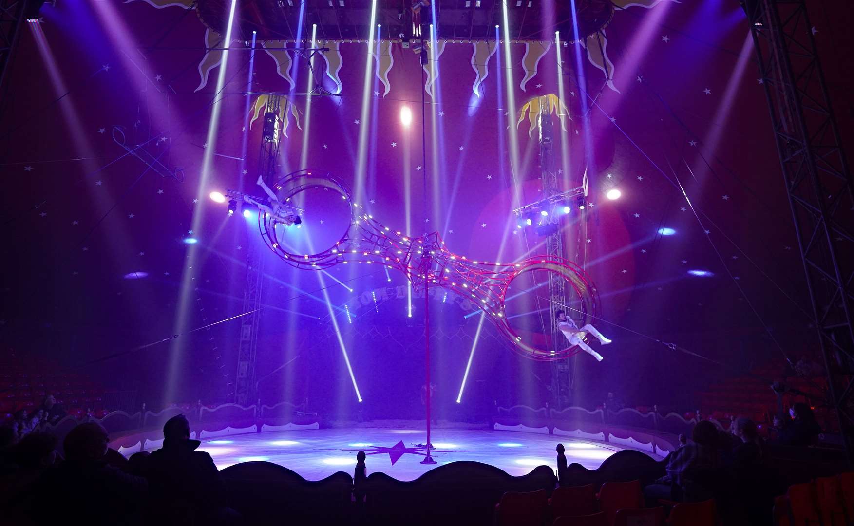 Tom and Jamie Duffy perform on the Space Wheel of Death at Tom Duffy’s Circus (Niall Carson/PA)