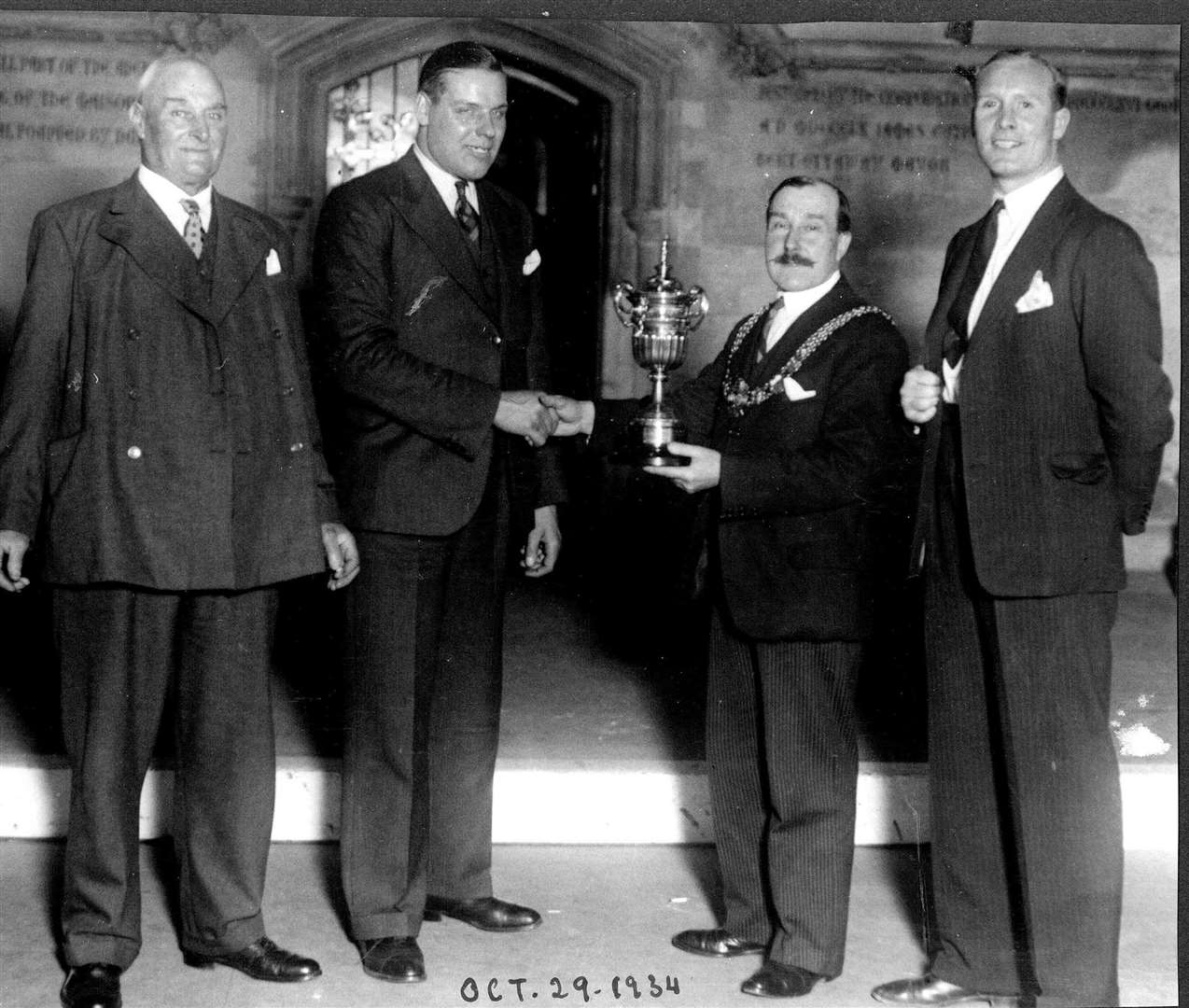 Edward Temme being presented with the Dover Gold Cup at Dover Town Hall, following his successful swim, in 1934. Picture from Dover Museum