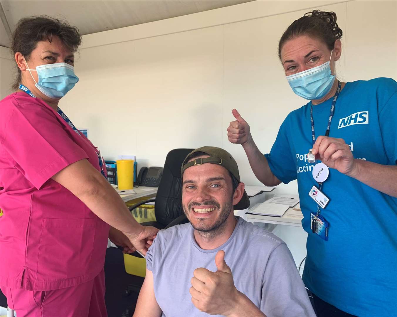Phil Myers was the 1000th person to get a Covid jab at the pop-up vaccination centre at The Open in Sandwich on Sunday