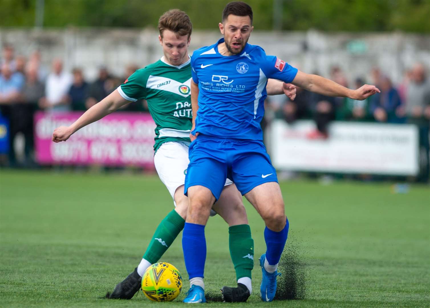 Ashford's Josh Wisson and Herne Bay's Mike West battle for the ball in last season's Isthmian South East play-off final. The sides meet again in the FA Cup this Sunday. Picture: Ian Scammell