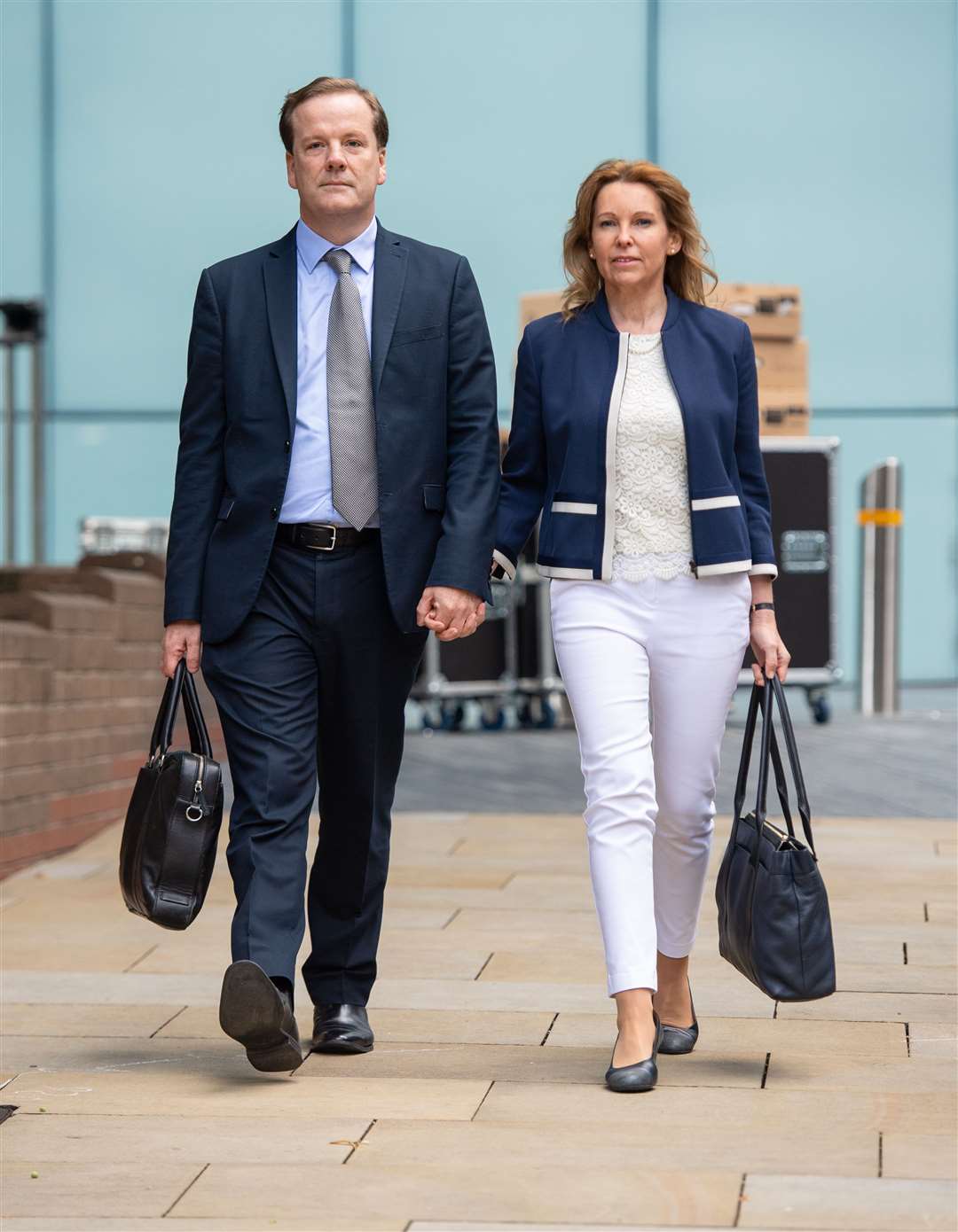 Former Conservative MP Charlie Elphicke arriving at Southwark Crown Court alongside MP for Dover Natalie Elphicke, his wife (Dominic Lipinski / PA)