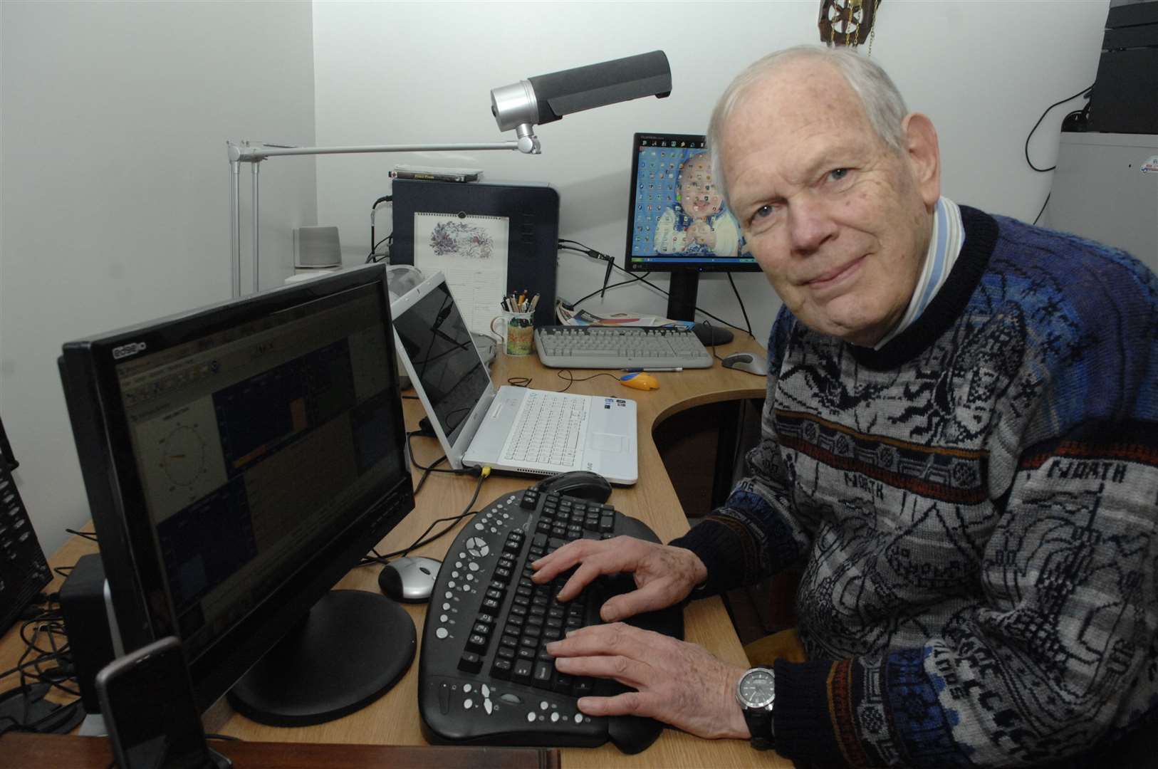 Jeremy Procter analysing the data from his weather monitoring station. Picture: Chris Davey