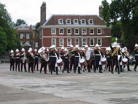 The City of Rochester Pipe Band and the Band of HM Royal Marines, Portsmouth, lead the way at the Beating Retreat, Chatham.
