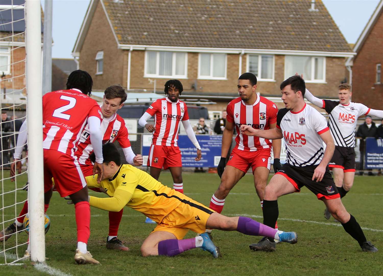 Rusthall keeper Tommy Taylor denies Riley Alford's close-range effort with a last-ditch save. Picture: Paul Willmott