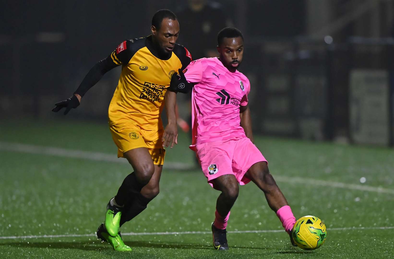 Cray Wanderers' Kyel Reid is up against Dartford's Michael Kedman. Picture: Keith Gillard