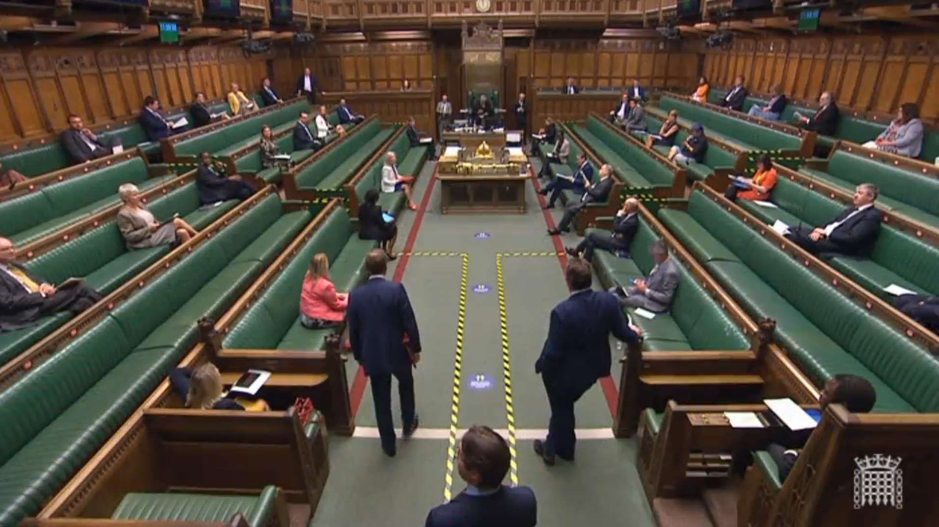 Hancock (left) before he walked to his seat in the Commons (UK Parliament)