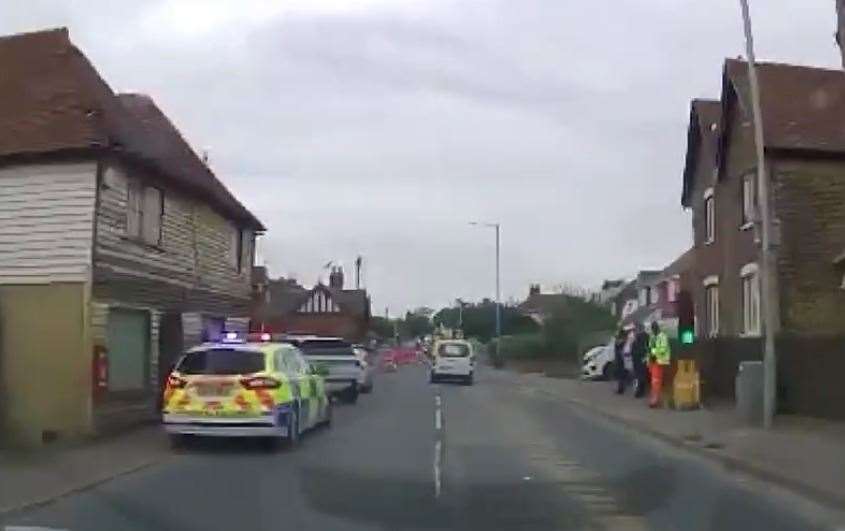 Police at the scene of the crash on the A2