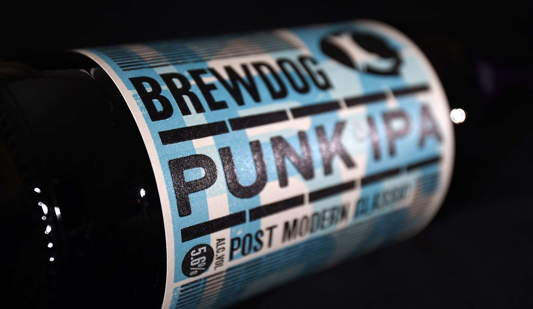 The letters between F and K on the poster were obscured by a can of Brewdog Punk IPA (Andrew Matthews/PA)