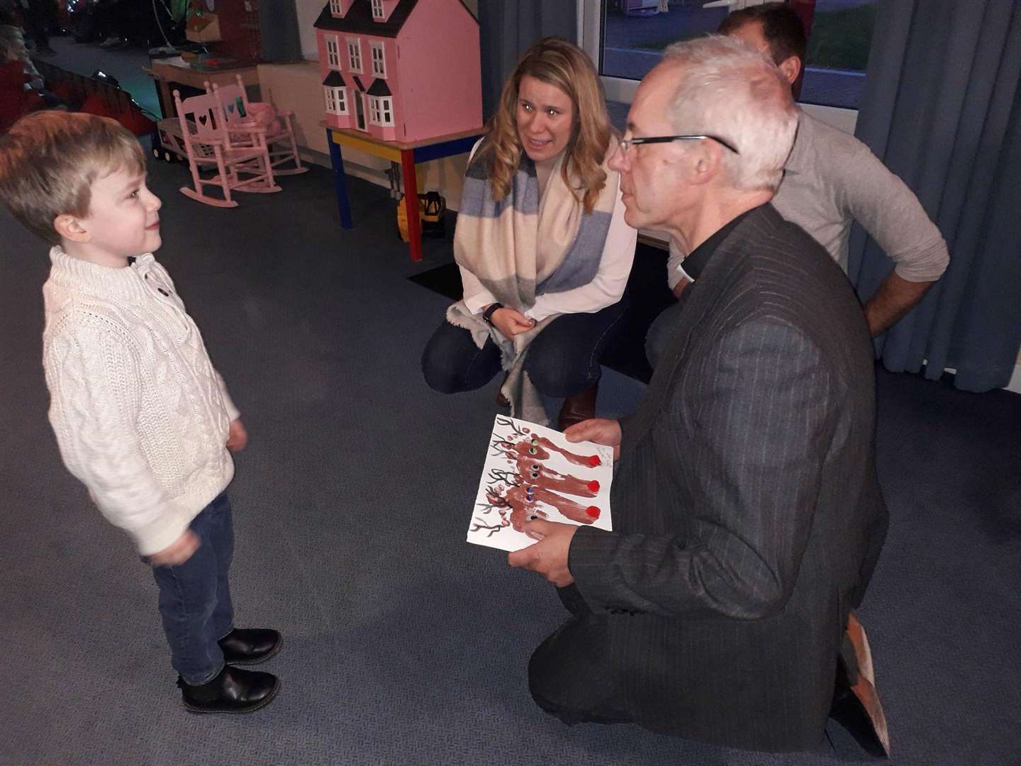 The Archbishop was presented with a Christmas card made by Demelza children